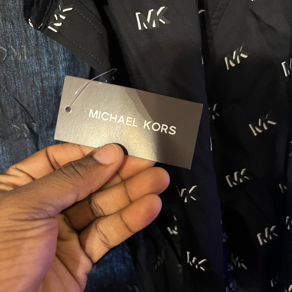 Michael Kors never been wear and still got the price tag on